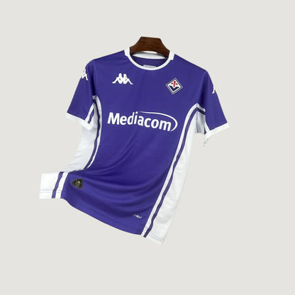 Maillot de football violet et blanc avec logo Kappa, sponsor Mediacom, sur fond neutre.