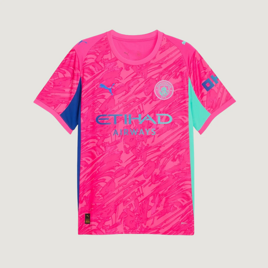 Maillot de foot Manchester City rose et bleu, design graphique, manches courtes.